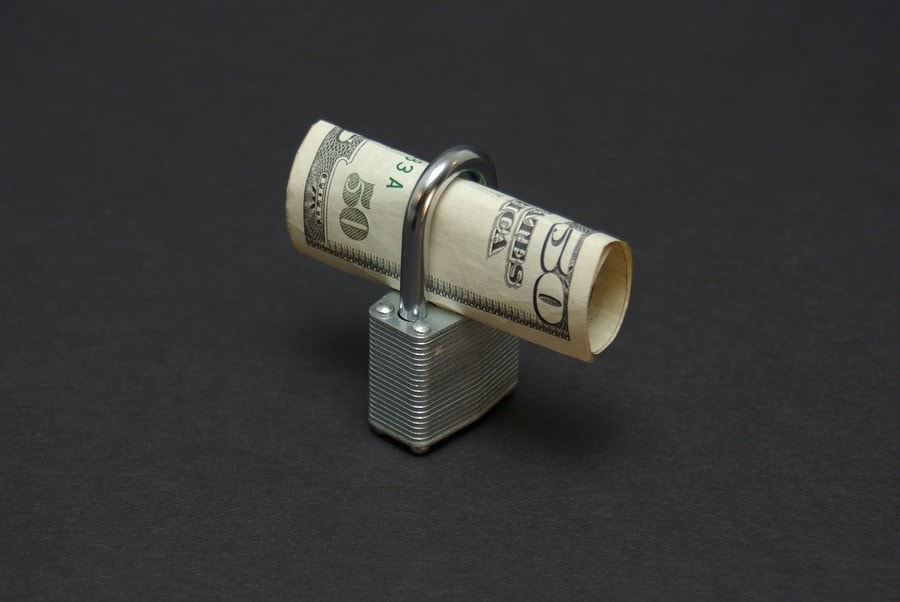 bigstock-Locked-Money-2295156