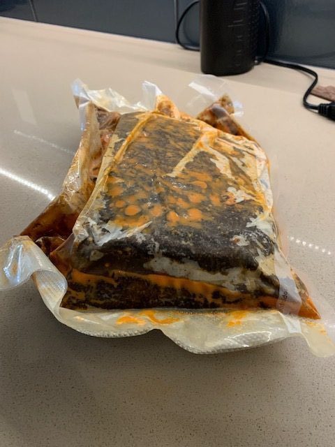 brisket in sealed bags after sous vide cooking